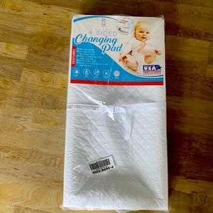 Brand new still wrapped and with a box  changing pad.